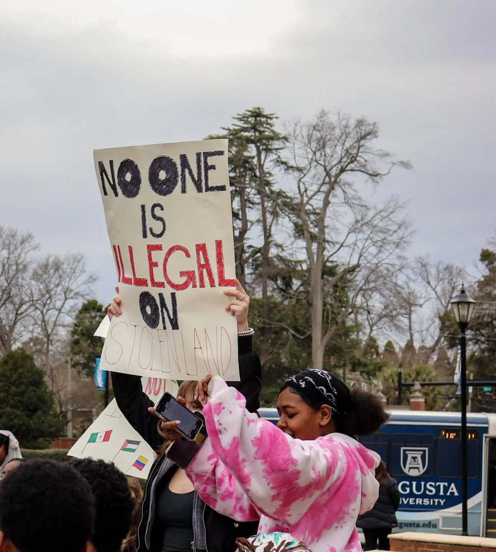 Students rally on campus to protest Immigration and Customs Enforcement
