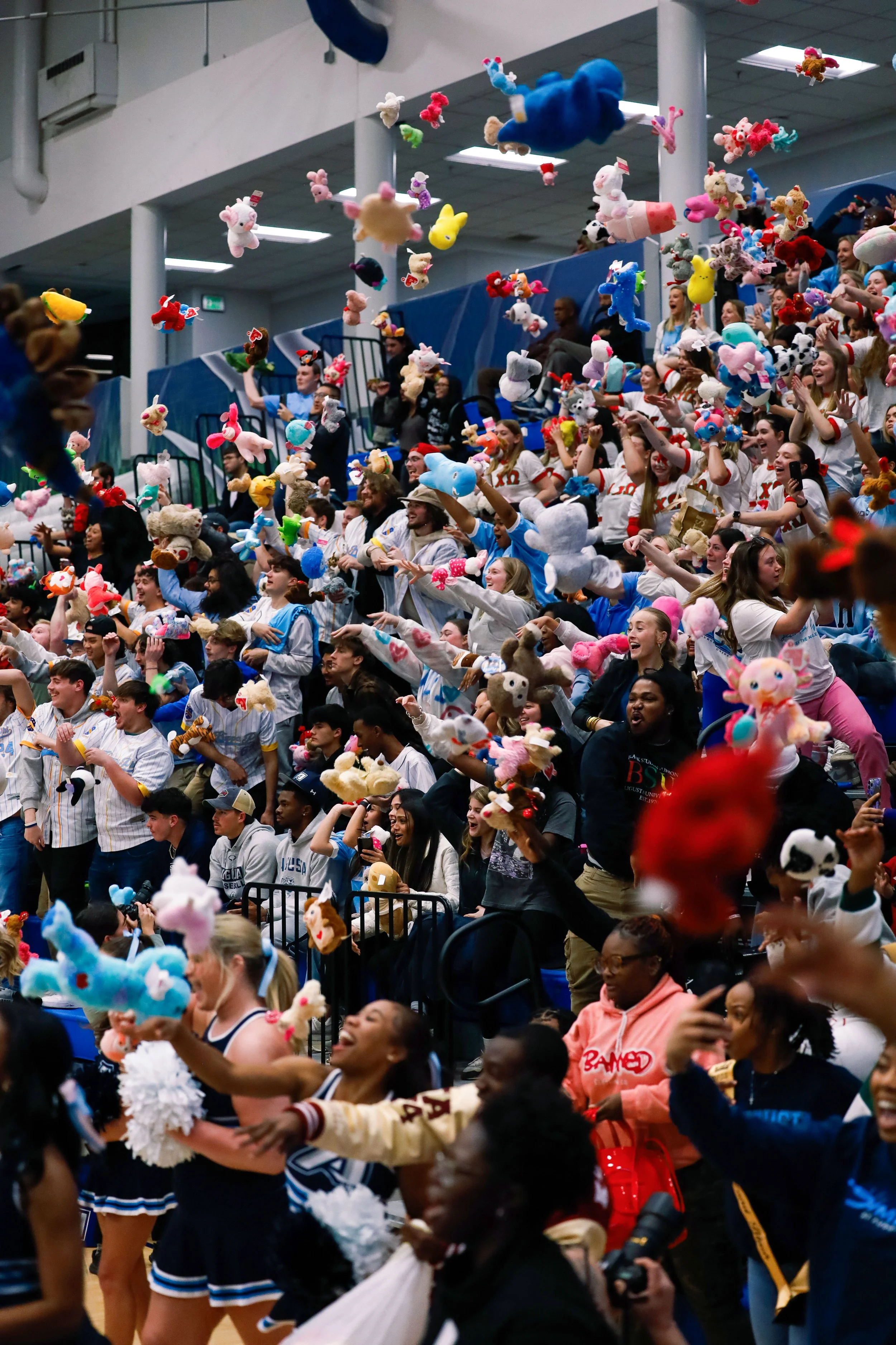  Students raining the court with stuffed animals (Photo by Lydia Williams/The Bell Ringer). 