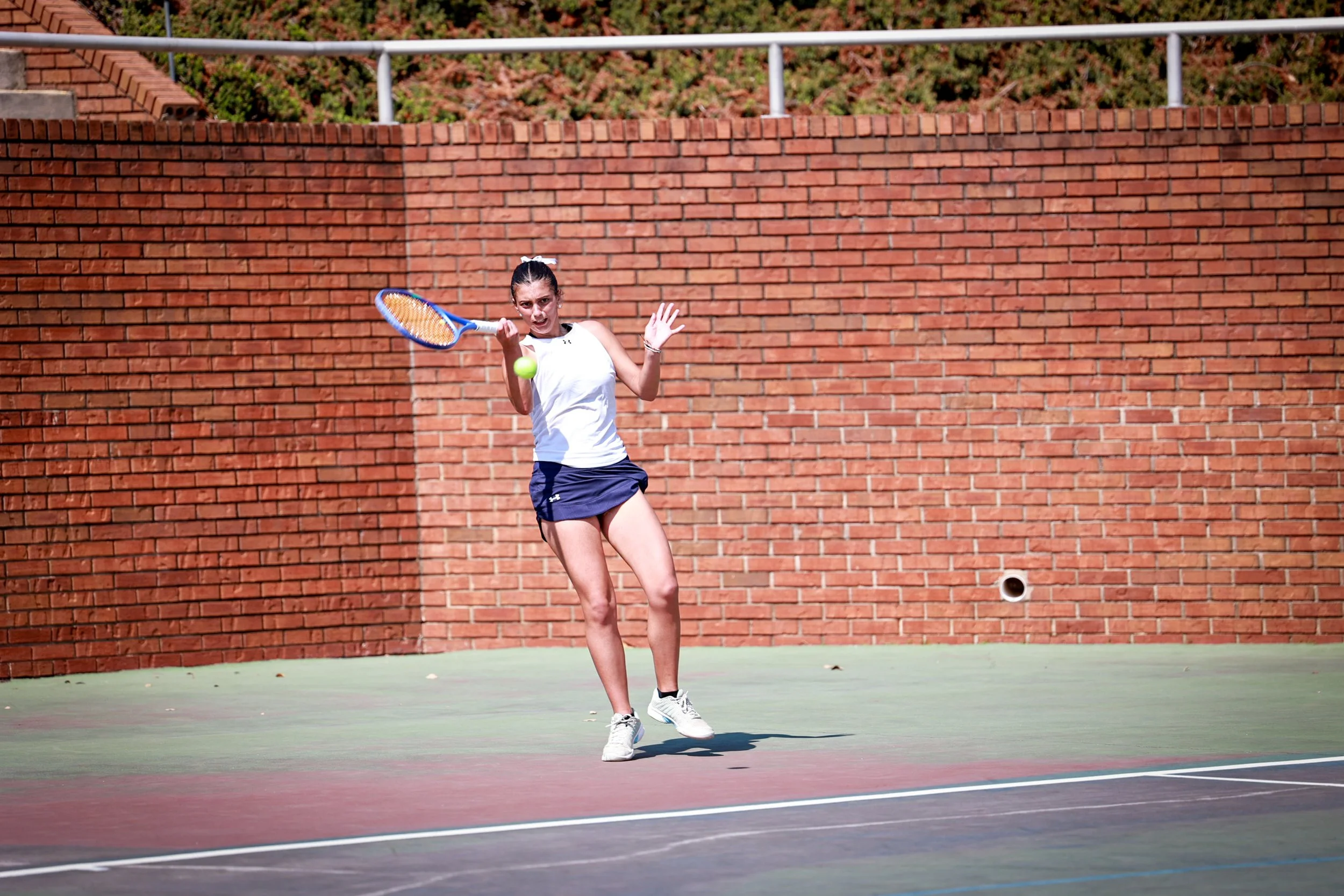  Maria Gento delivers a nice forehand down the line for a point. (photo by Rodrigo Burgos Avila/the Bell Ringer) 