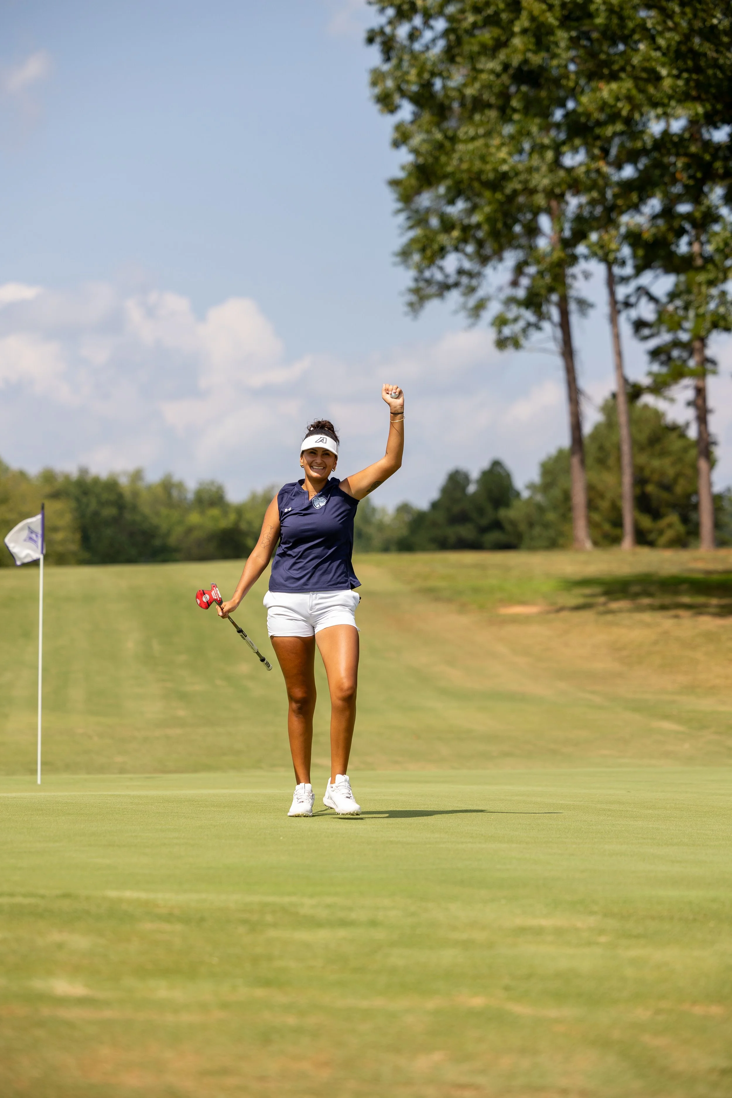  Sofia Valera celebrates after making a birdie on one of her final holes. Valera shot a 2-under-par 70. 