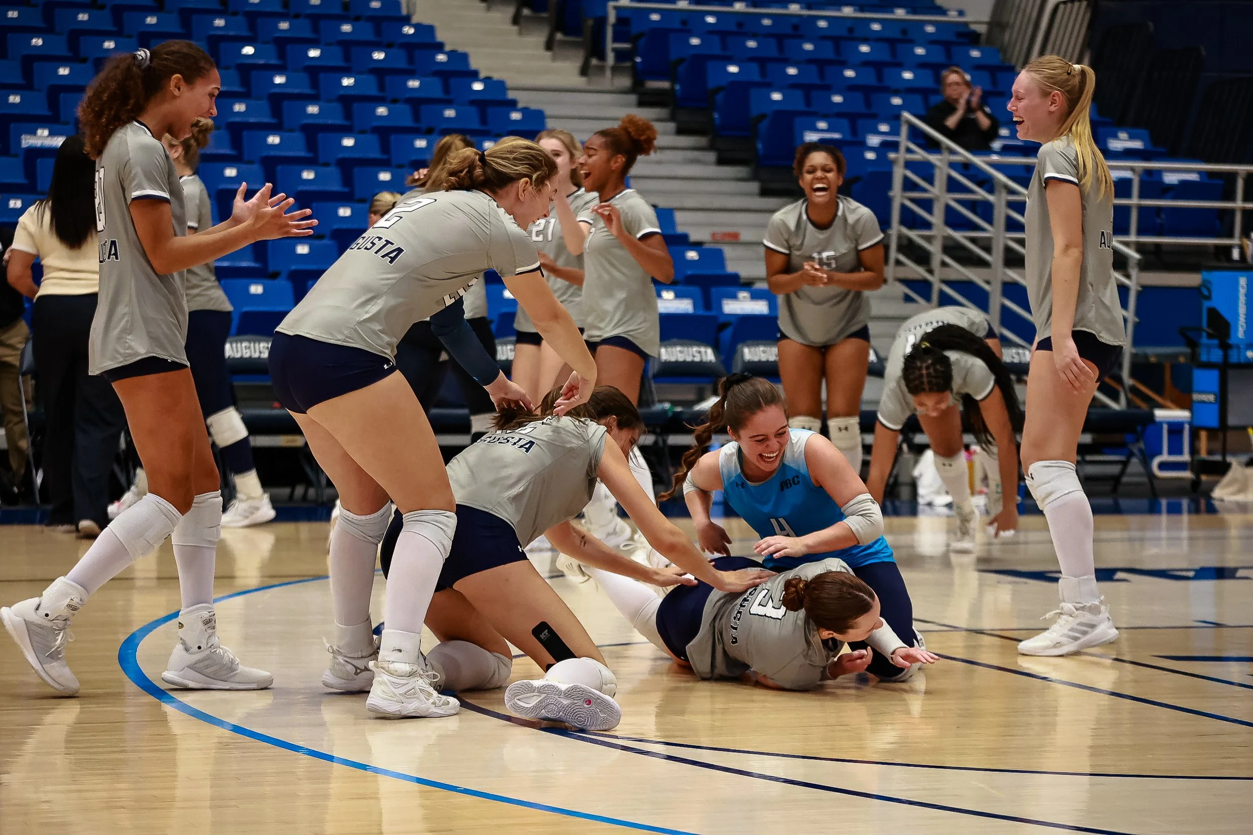  The Jags celebrate the point that won the them the fourth set with a score of 25-3, a kill from Hunter MacFarland (3), a set that completely turned the tides in AU’s favor. (photo by Rodrigo Burgos Avila/the Bell Ringer) 