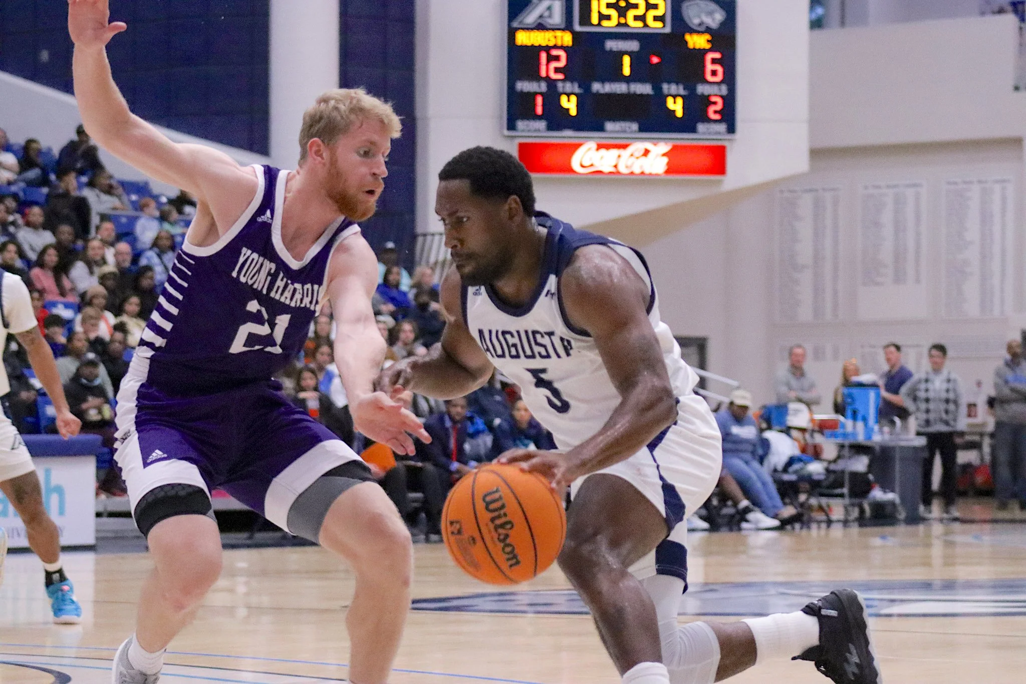  Miguel Arnold (5) opened up the AU offense with his early drivers; Arnold had 23 points to help lead the Jaguars to an 88-72 win over Young Harris. (photo by Madison Keel) 