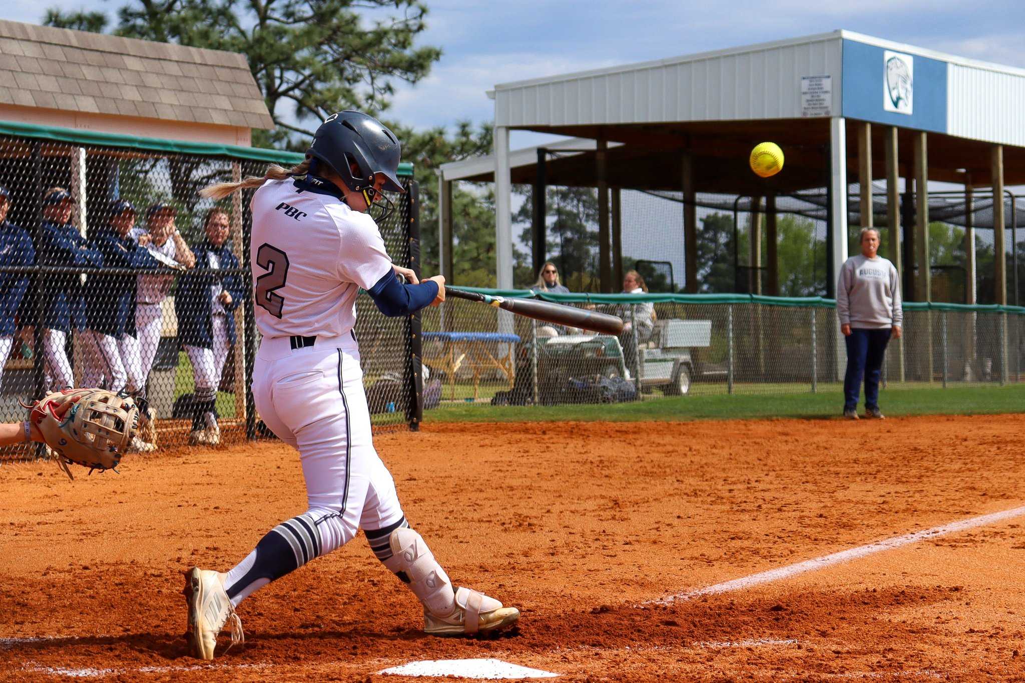  Lauren Barrett drives the ball for the Jaguars. At the top of the page, Ansley Gibson was in command for four innings in the opener. (photos by Madison Keel) 