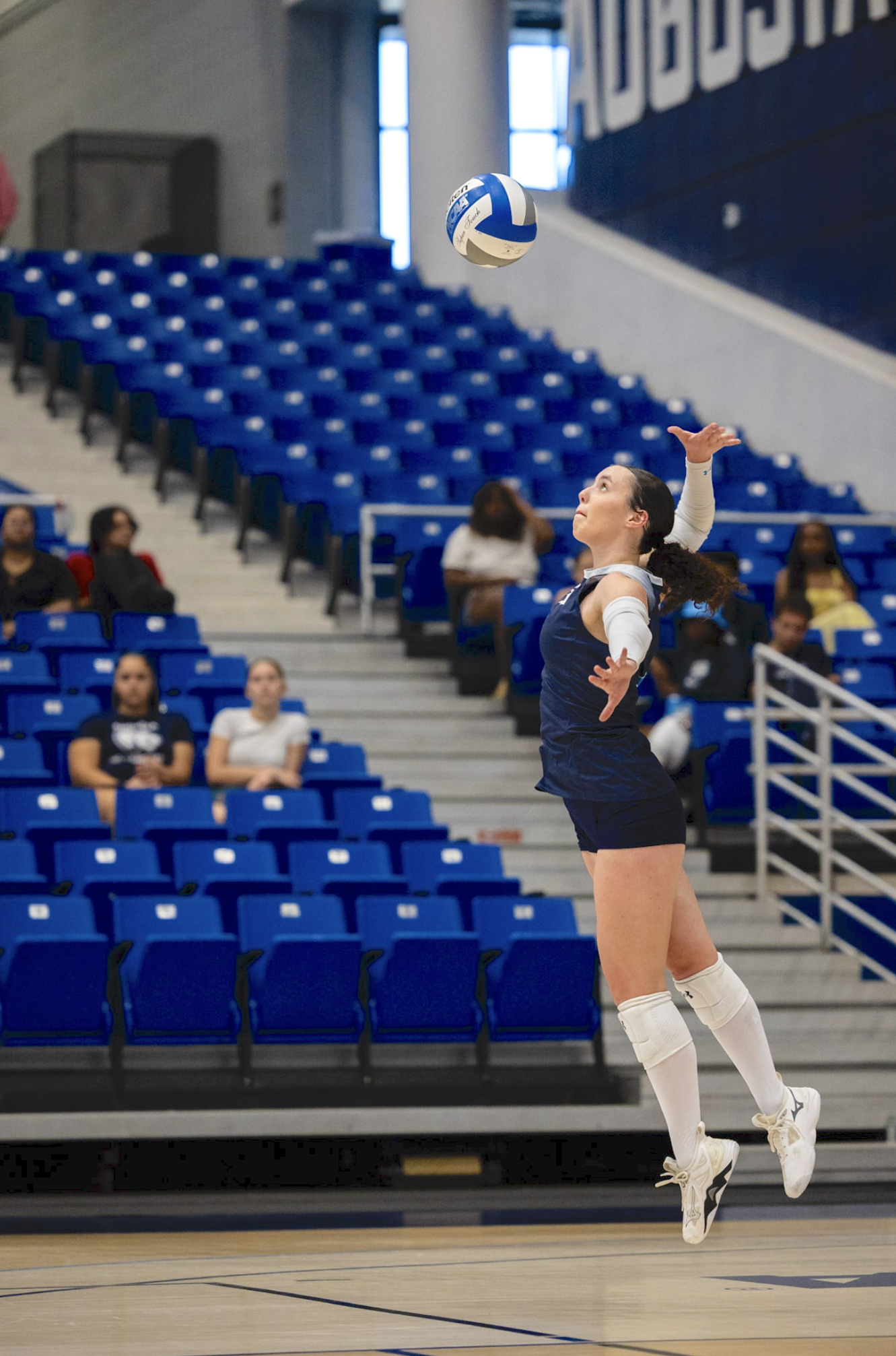  Hunter MacFarland serves for the Jaguars. (photo by Rodrigo Burgos Avila/the Bell Ringer) 