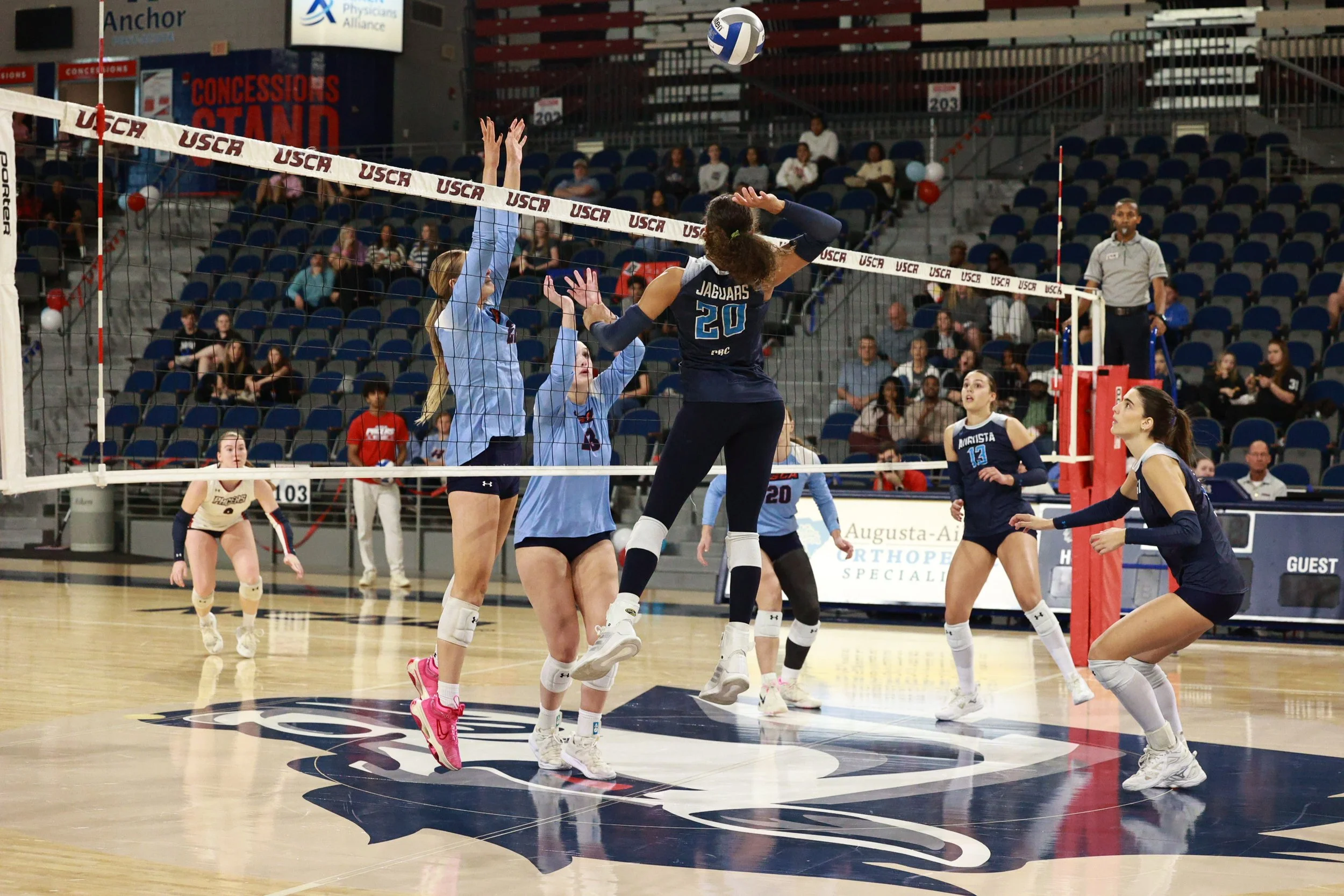  Layne Witherspoon (20) attacks down the middle for one of her eight kills. She finished the match with no errors. (photo by Rodrigo Burgos Avila/the Bell Ringer) 