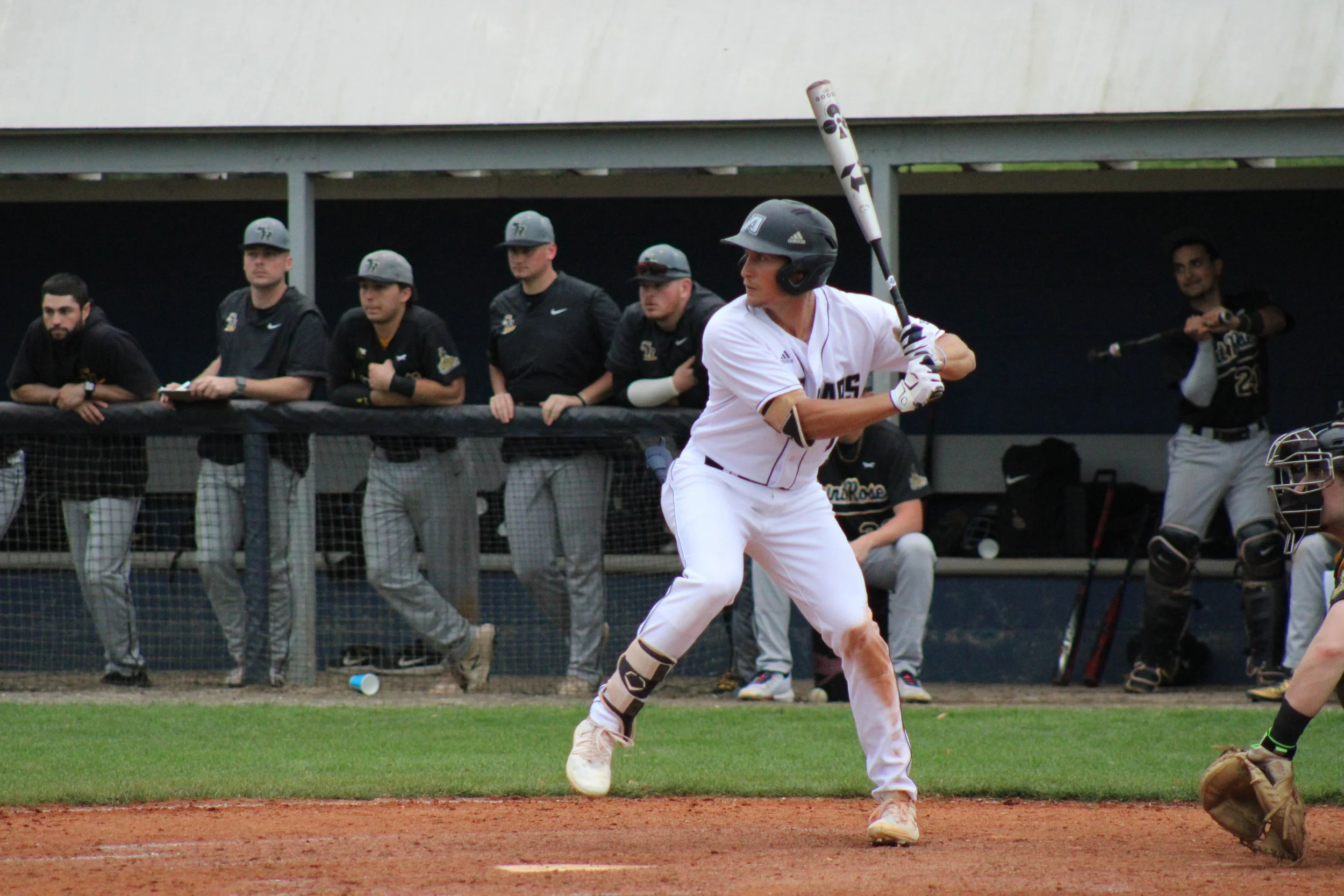  Skylor Murphy prepares to swing; he had three hits and drove in two runs in the 7-4 win over College of Saint Rose. At the top of the page, Brian Trepanier pitched one inning with two strikeouts. (photos by Chris Rickerson) 