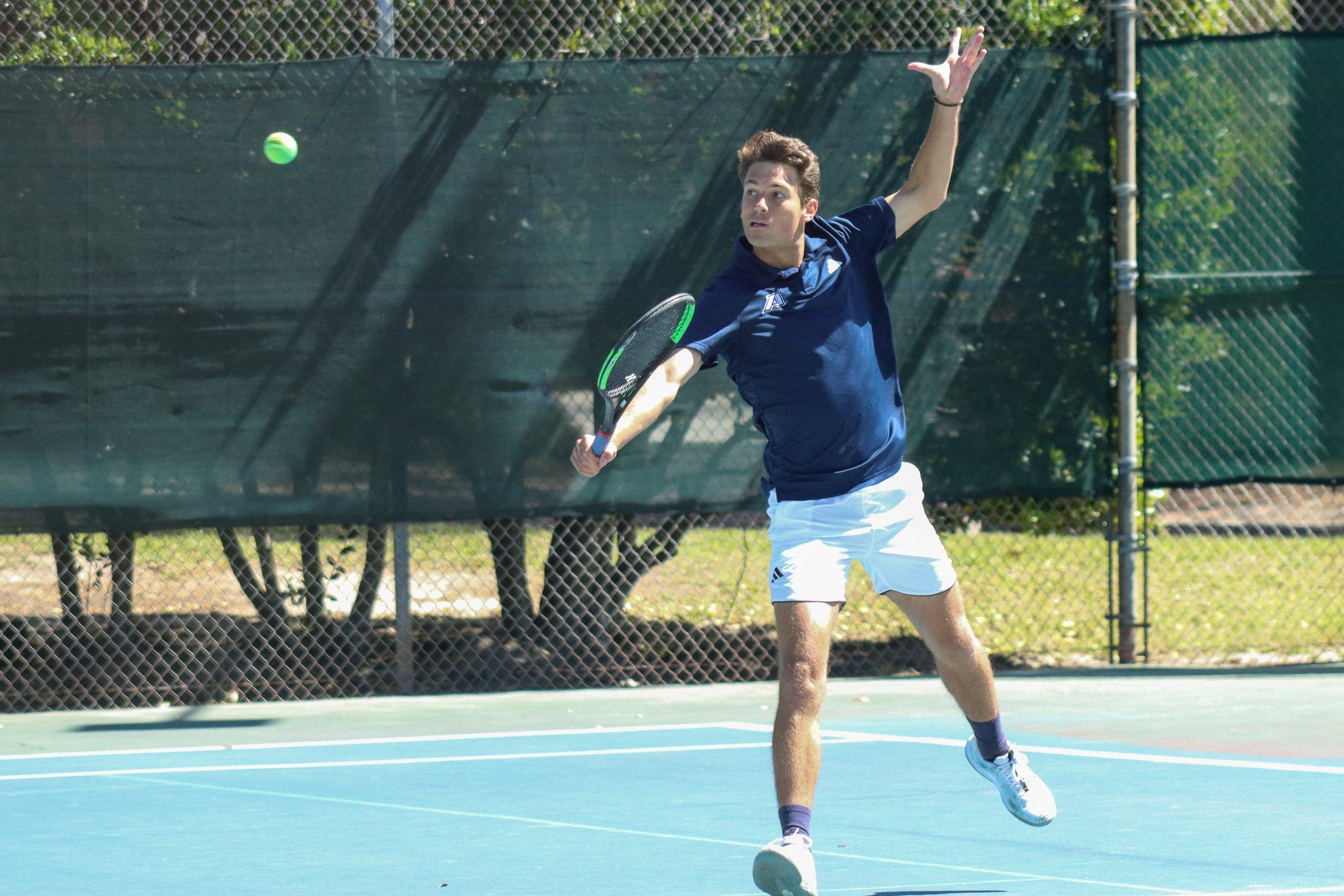   AU’s Alexis Bailhache returns the ball with a backhand volley during the Jaguars’ match with Middle Georgia State University. Bailhache won his match over  Jalif Mariano 7-5, 6-1.  (photo by Madison Keel)  