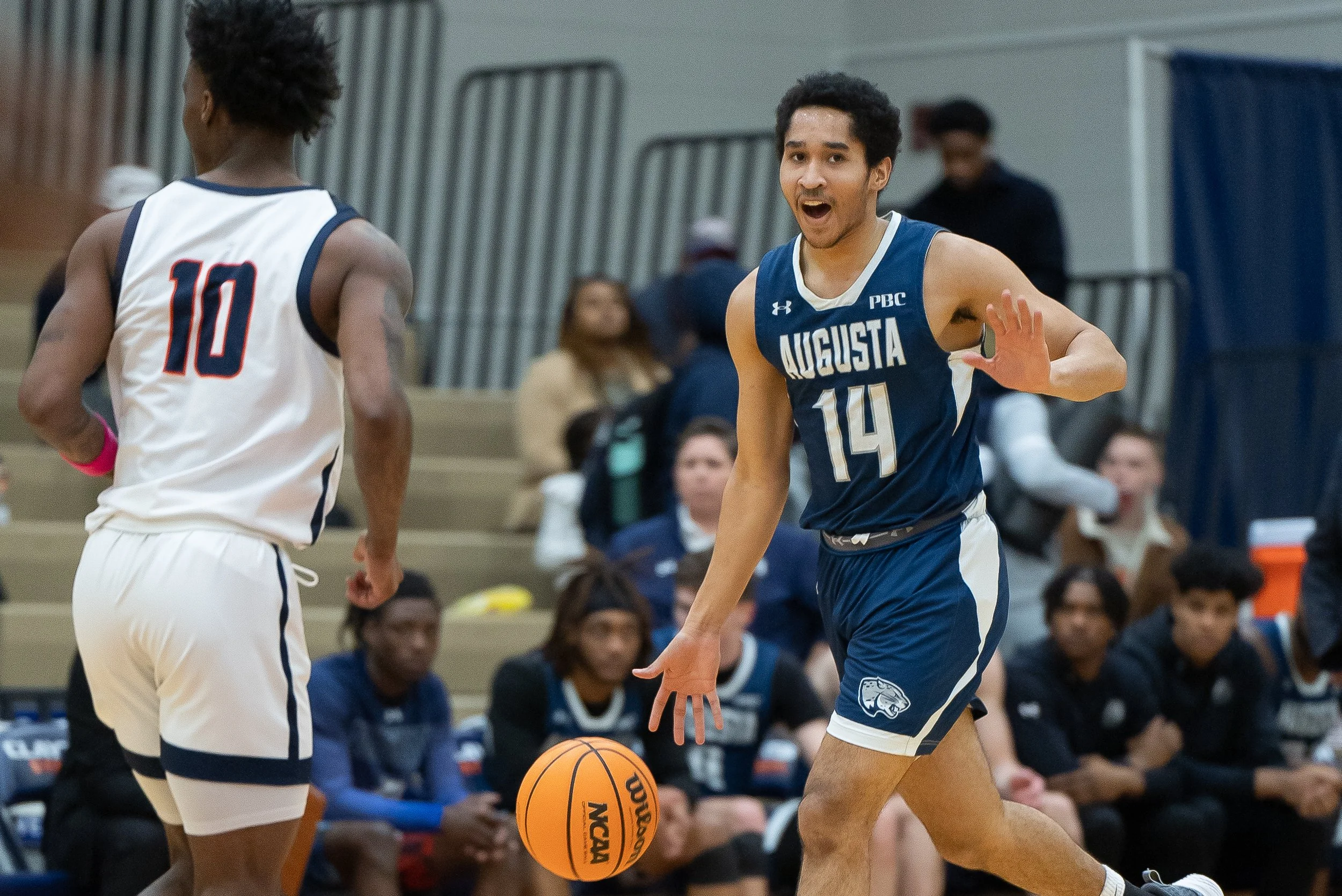  AU freshman John St. Germain II (14) totaled 11 points and five assists, running the Jaguar offense from the point guard position. The Charlottesville, Va., product had only two turnovers and made 5 of 7 from the field. (photo by Rachel Carman) 