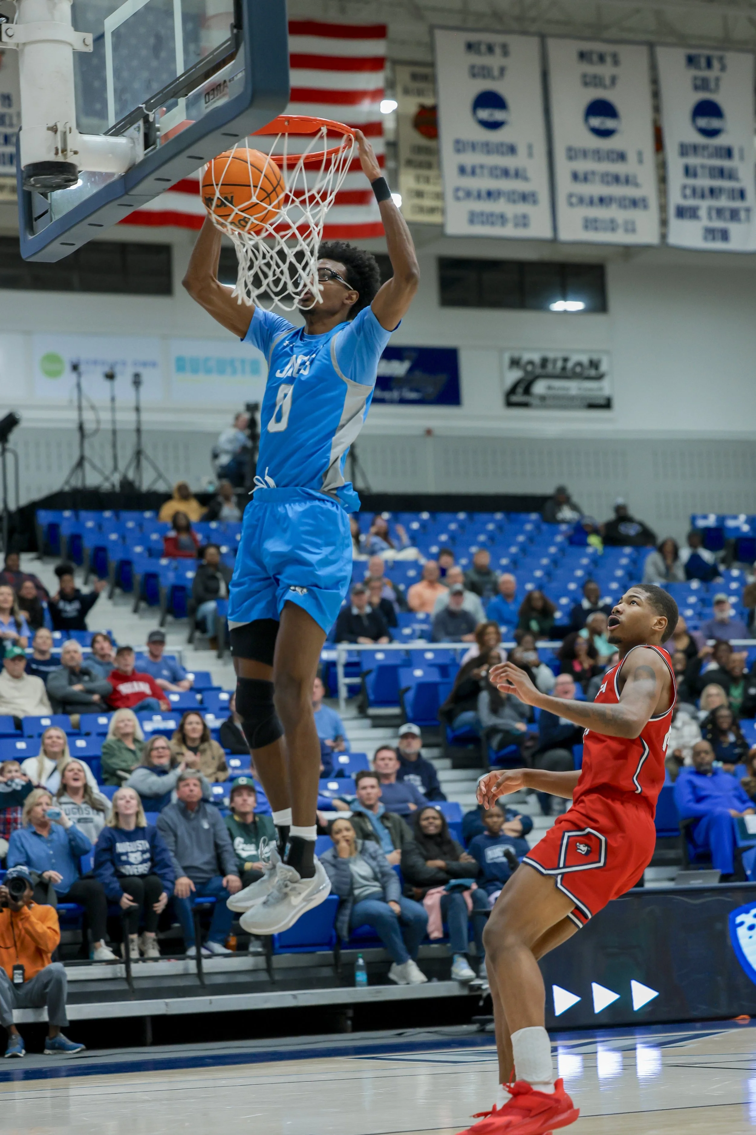  Evan Joyner (0) flushes one for the Jaguars; Joyner finished with eight points and six rebounds. (photo by Lydia Williams/the Bell Ringer) 