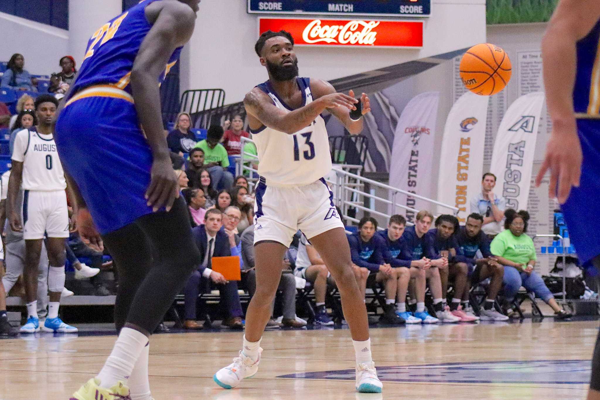  Jaguar forward Ja’Queze Kirby (13) totaled six points and six rebounds in the final. His defense and rebounding have been crucial to AU’s success this season. (photo by Madison Keel) 
