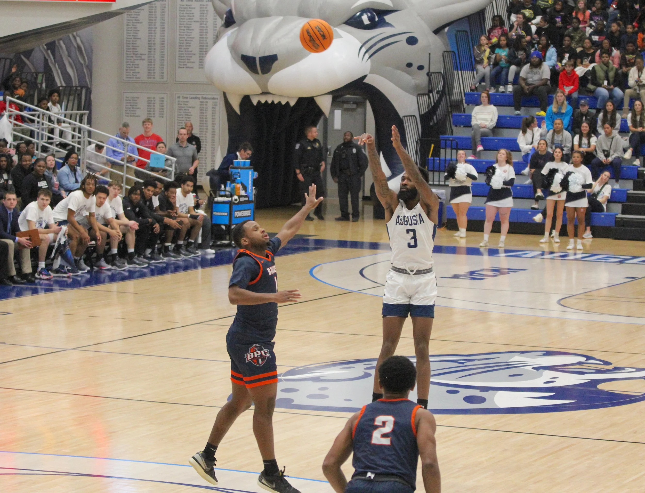  Ja’Queze Kirby (3) made four straight 3-pointers to start the game and led the Jaguars to an 86-73 win over the Brewton-Parker Barons. Kirby finished with 25 points. (staff photo) At the top of the page, Kirby goes up for a slam dunk in the second half. (photo by Domonic Macias) 
