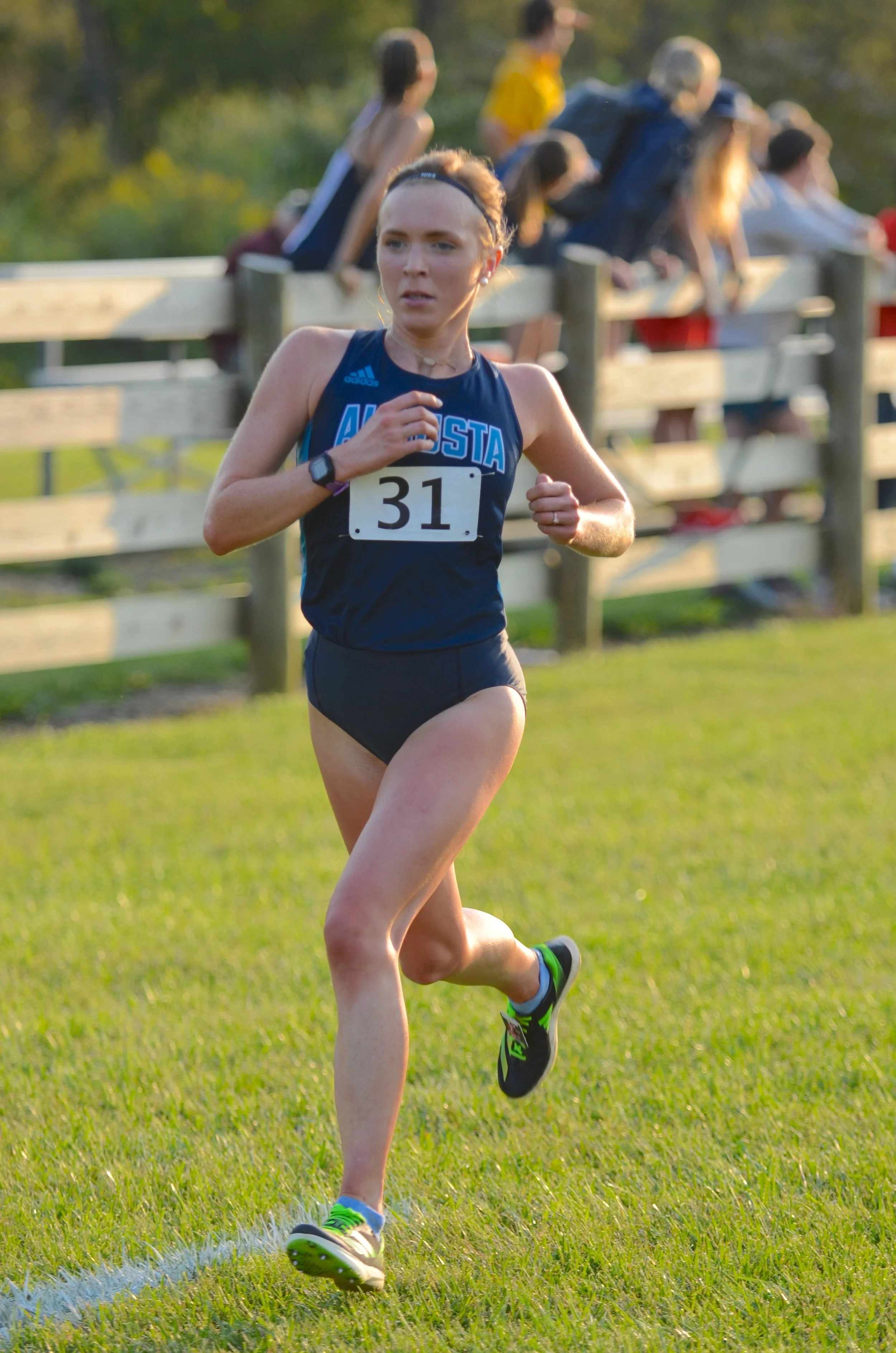  Cassie Lagan shows her form in a cross-country meet. She finished second in the Peach Belt Conference Championship in November. At the top of the page, she and teammate Riley Triplett consistently finished on the podium during the fall cross-country season. (photos by Madison Keel) 