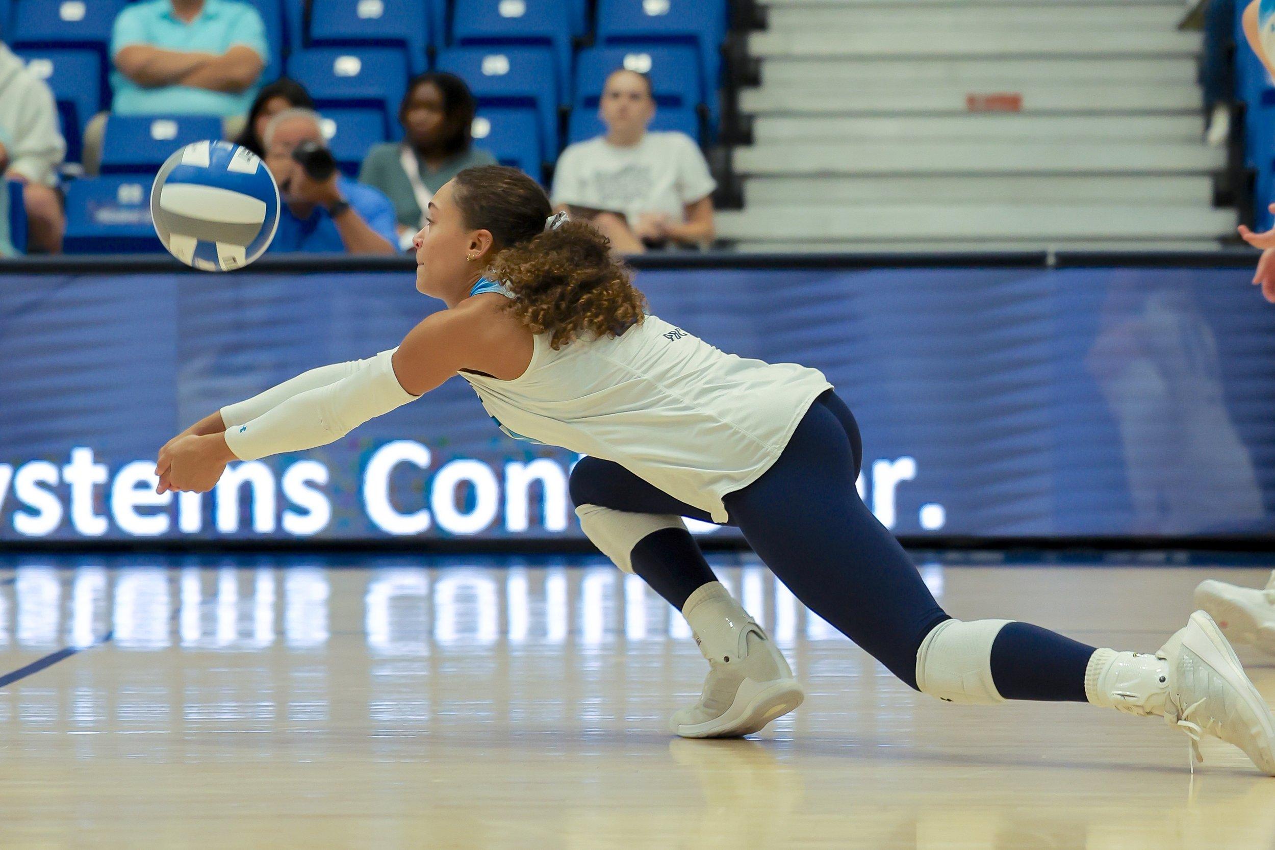  Layne Witherspoon was named honorable mention all-American after an outstanding junior season when she tied teammate Lauren Nelson with 346 kills. At the top of the page, Hunter MacFarland was one of the team’s most consistent servers with 44 aces. (photos by Lydia Williams/the Bell Ringer) 