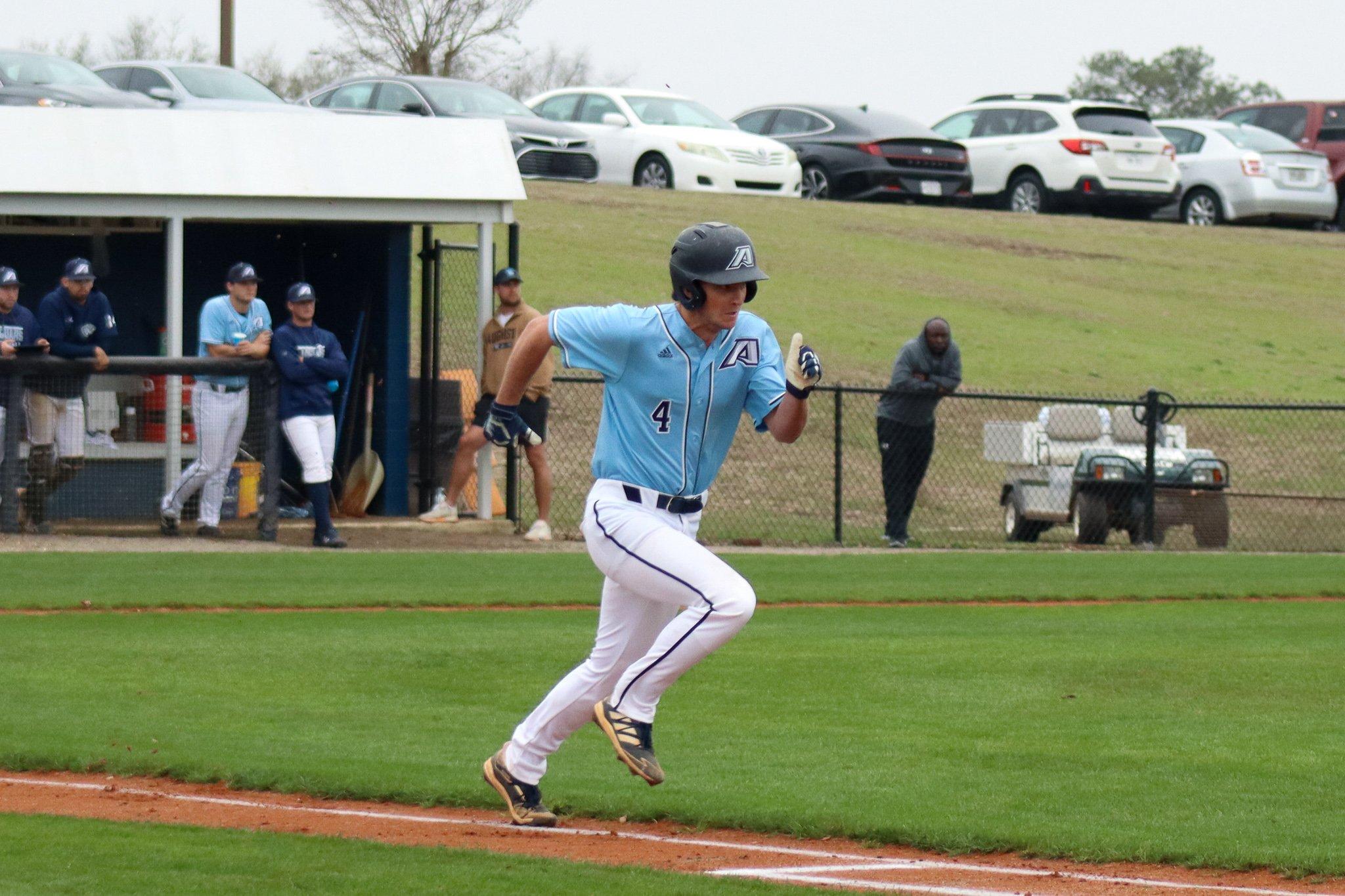  AU’s Trevor Maddox (4) heads down the first-base line trying to leg out a hit. At the top of the page, left-hander Britt Kelly shows his form on the mound. (photos by Madison Keel) 