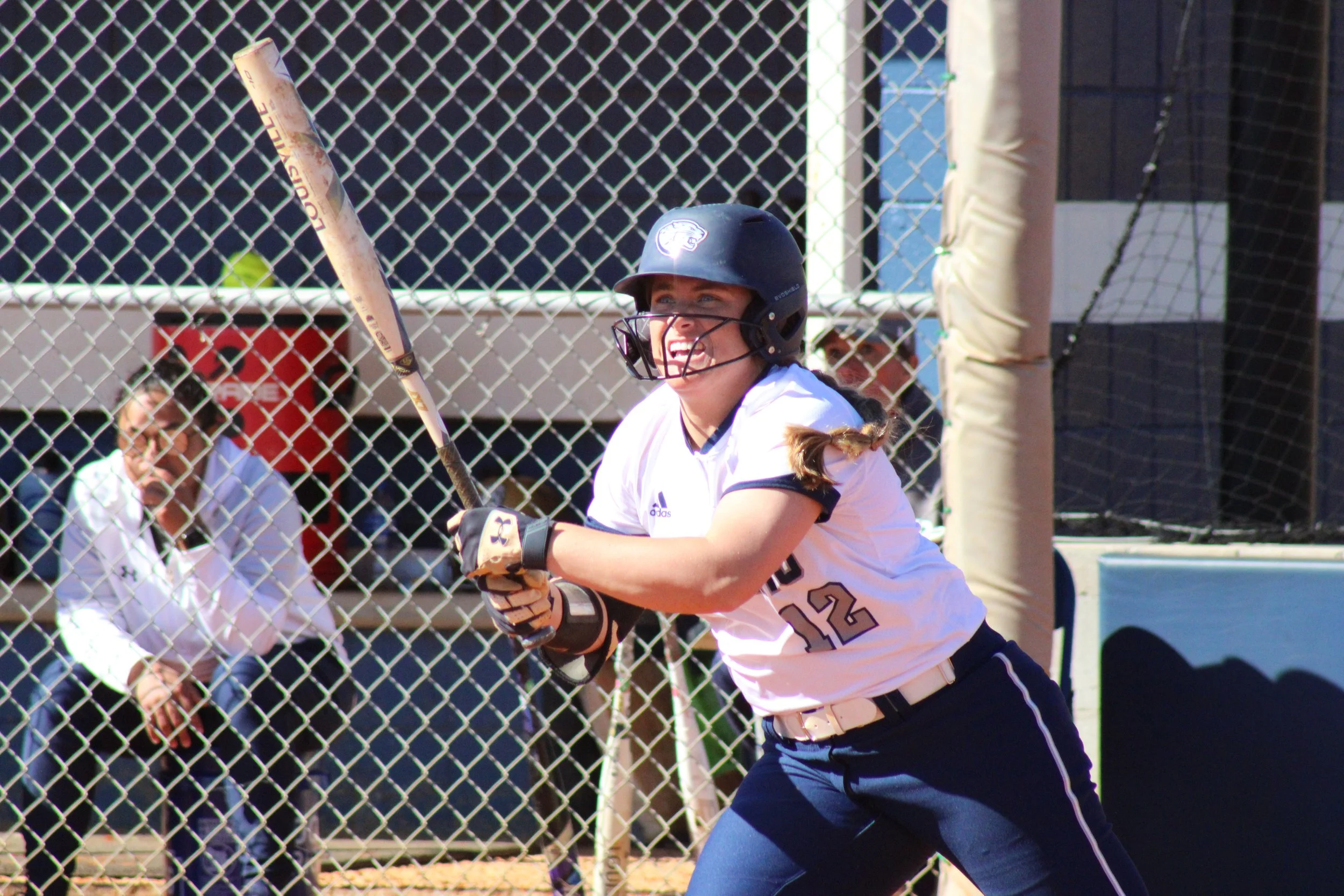  AU’s Summer Frye watches the ball go down the line during the Jaguars’ split with Queens. (photo by Chris Rickerson) At the top of the page, Shelbie Summerlin hits a home run in Augusta’s first-game 4-1 victory. (photo by Madison Keel) 