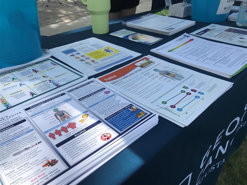  The Georgia Cancer provided facts about cancer to the attendants of June’s Pride Month event.  (photo by Maryclaire Regan)  
