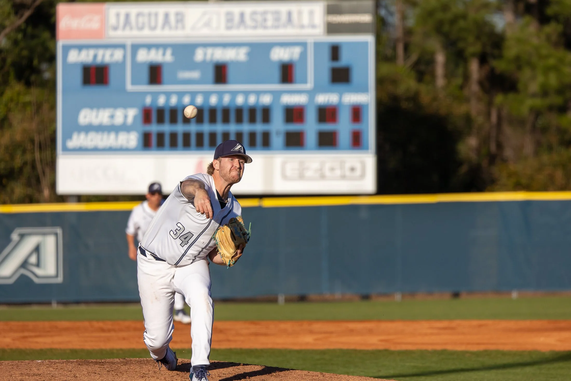  Right-hander Mason Bernard hurled a three-hitter over seven innings to lead AU to a 9-0 win over Kentucky Wesleyan. (photo by Paula Toole, AU Athletics) At the top of the page, junior Brady Loughren had five hits in seven at-bats on Saturday, including a triple. (photo by Shelbie Summerlin) 