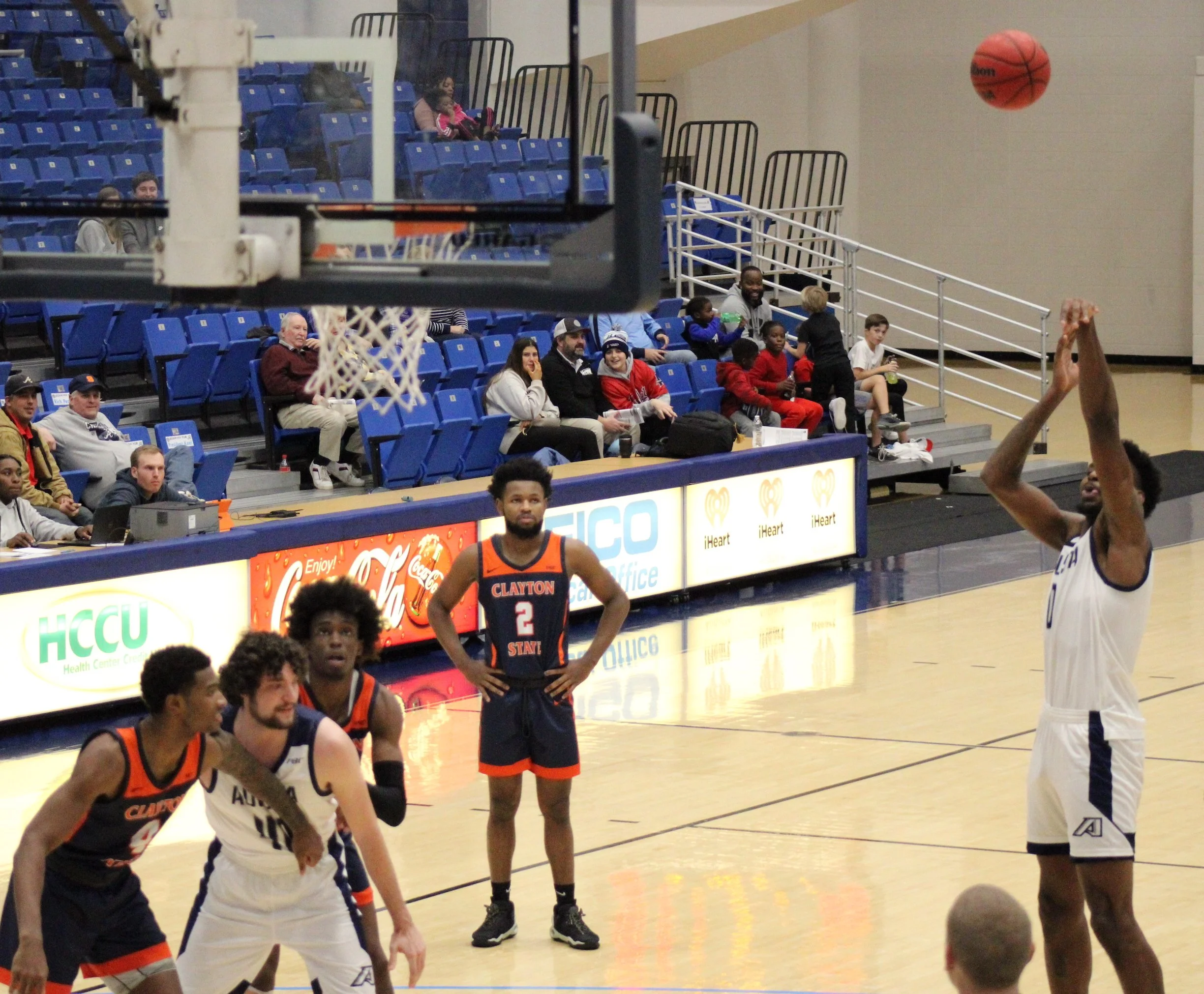  Tyshaun Crawford (0) shows his form at the free-throw line; Crawford made 14 of 17 from the stripe in AU’s 85-70 win over Clayton State. Teammate Jack Johnson (second from left) prepares to rebound in case of a miss. (photo by Chris Rickerson) 